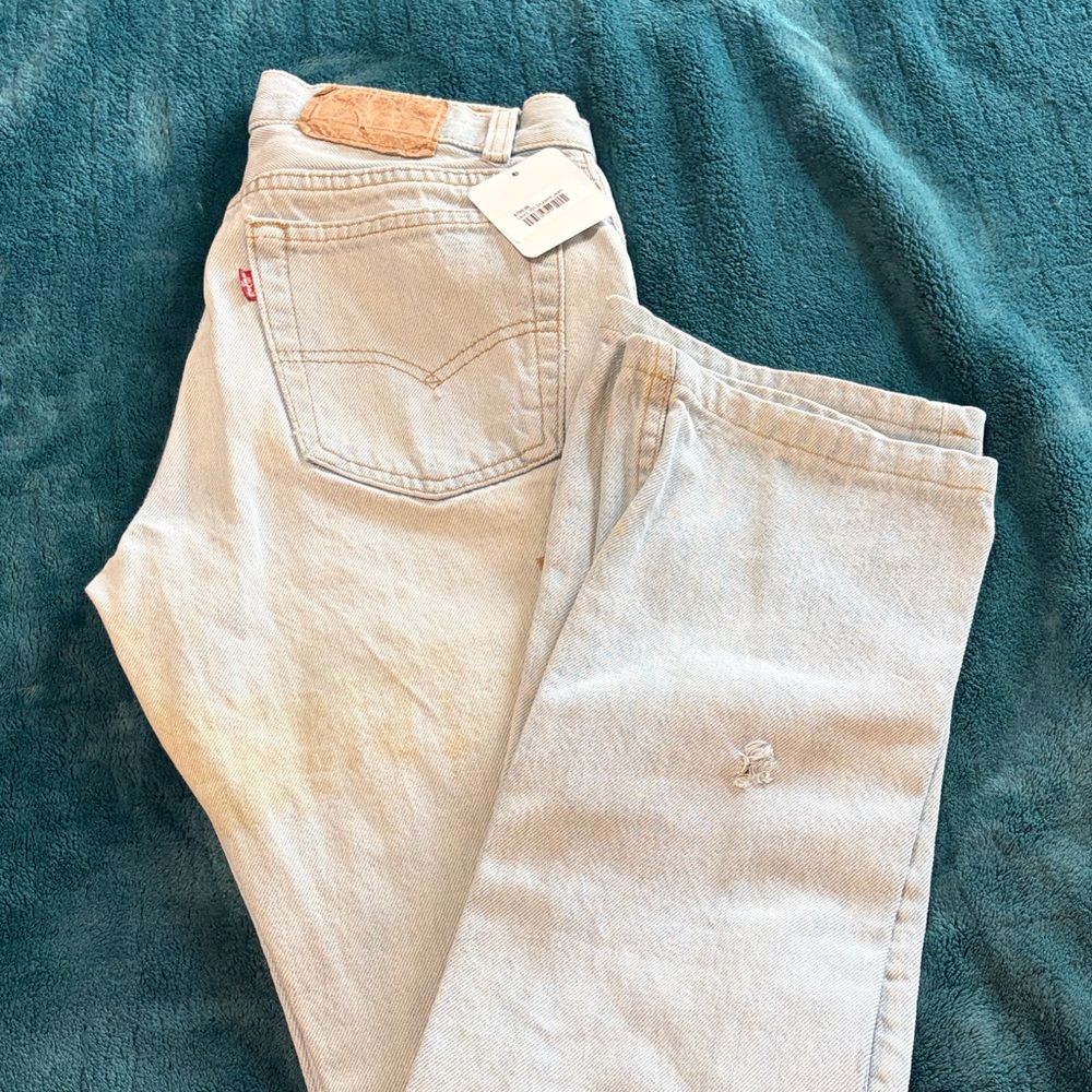 Levi's Pale Blue High-Rise Women's Jeans 701 student jeans distressed